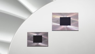 Two different versions of Google's quantum computer chip, Sycamore, shown on a light gray backdrop