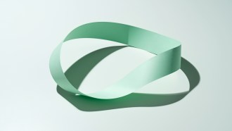 An illustration of a green Möbius strip, a loop of paper with a half-twist in it.